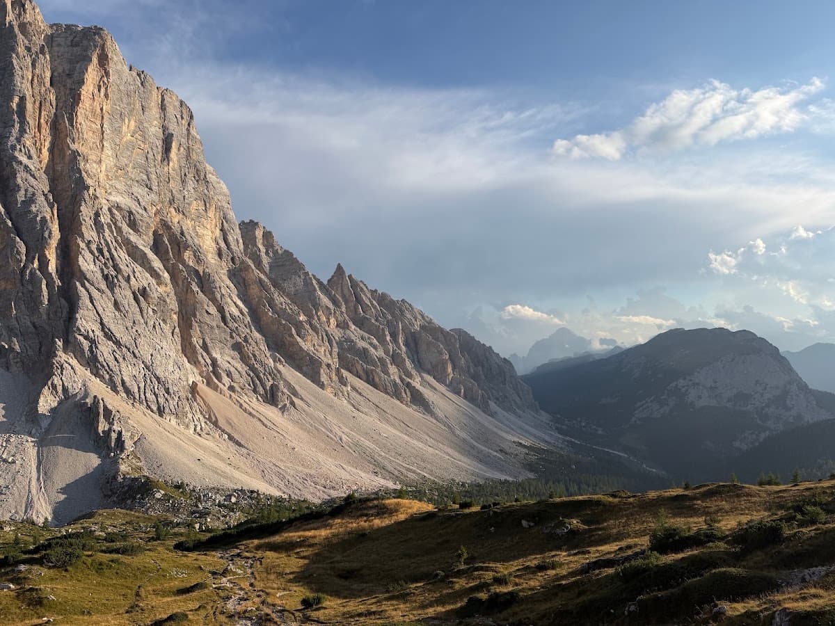 Alpine mountain peaks with rocky cliffs and valley below