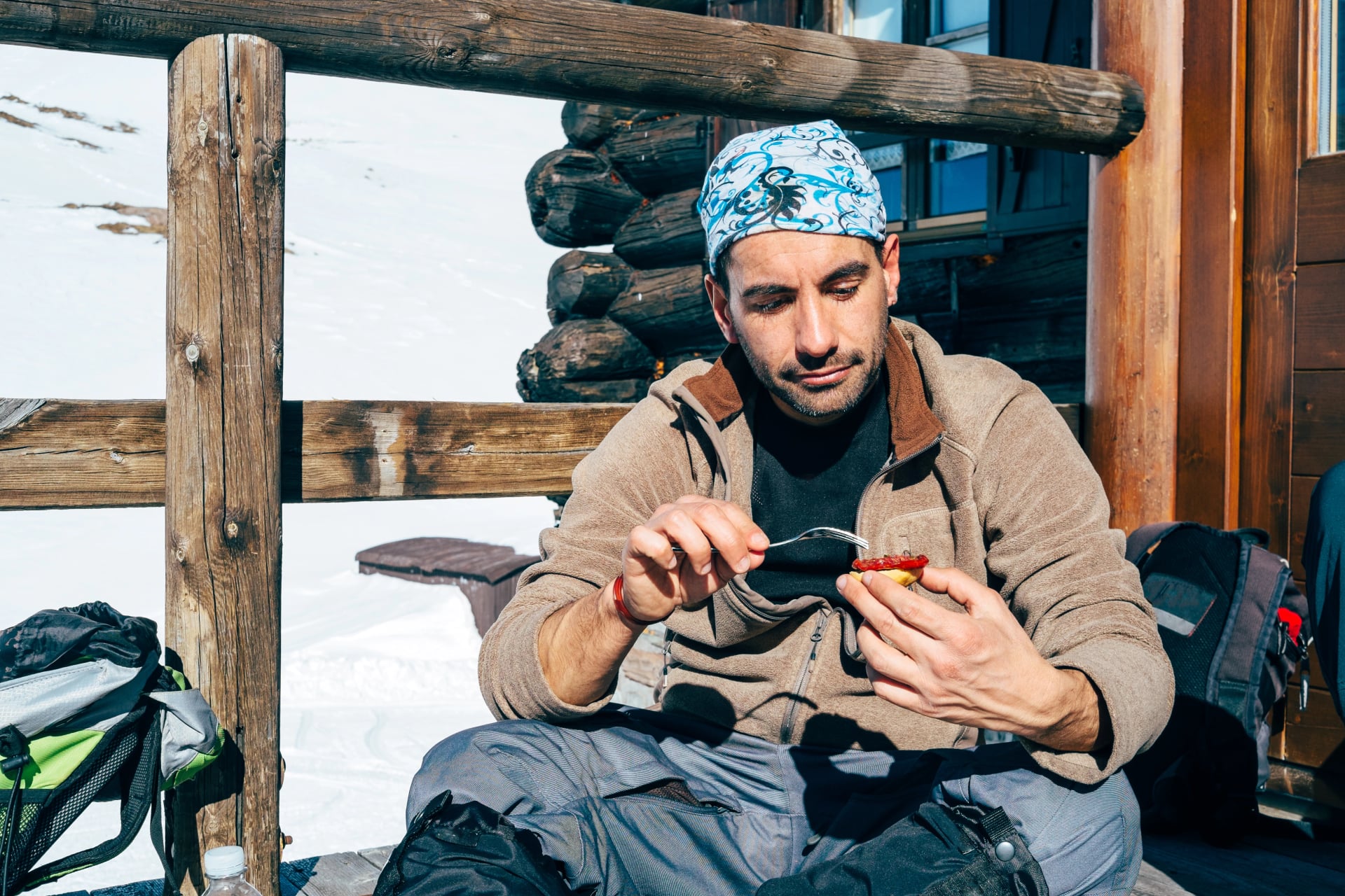 Young hiker having a snack