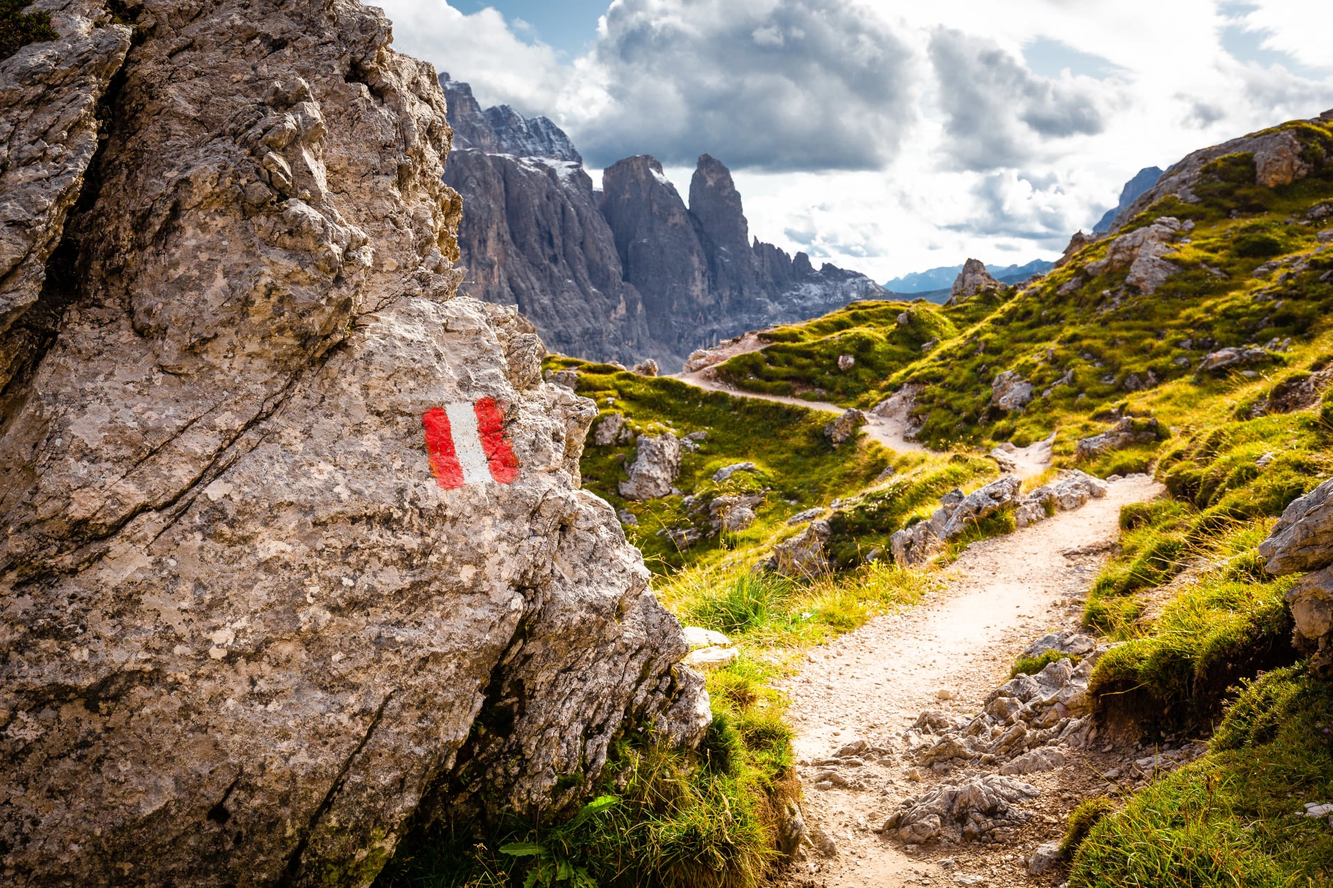 Mountain trail marking Gruppo Sella massif, South Tyrol Italy alps.