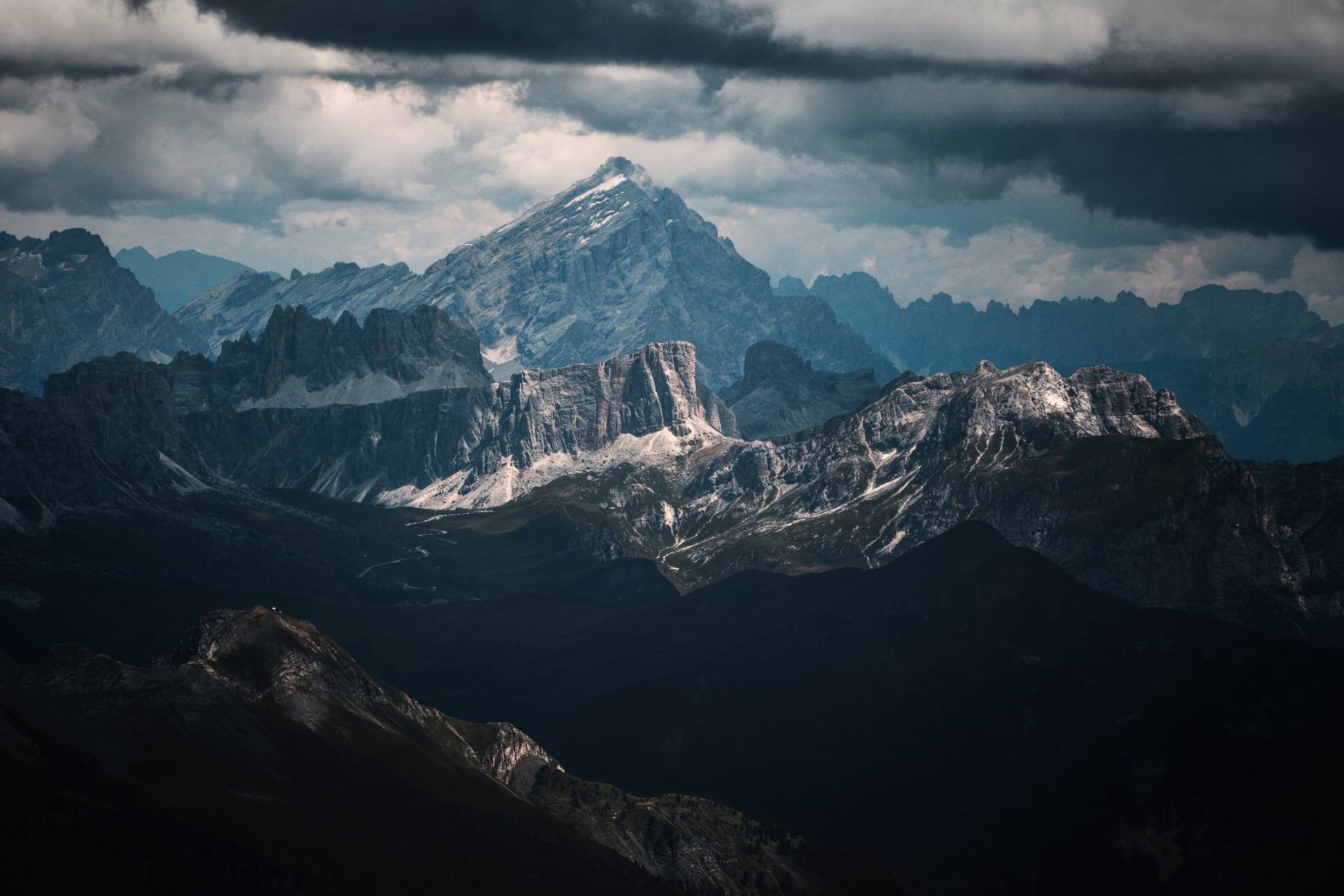 landscape of the italian dolomites in the morning below the storm clouds