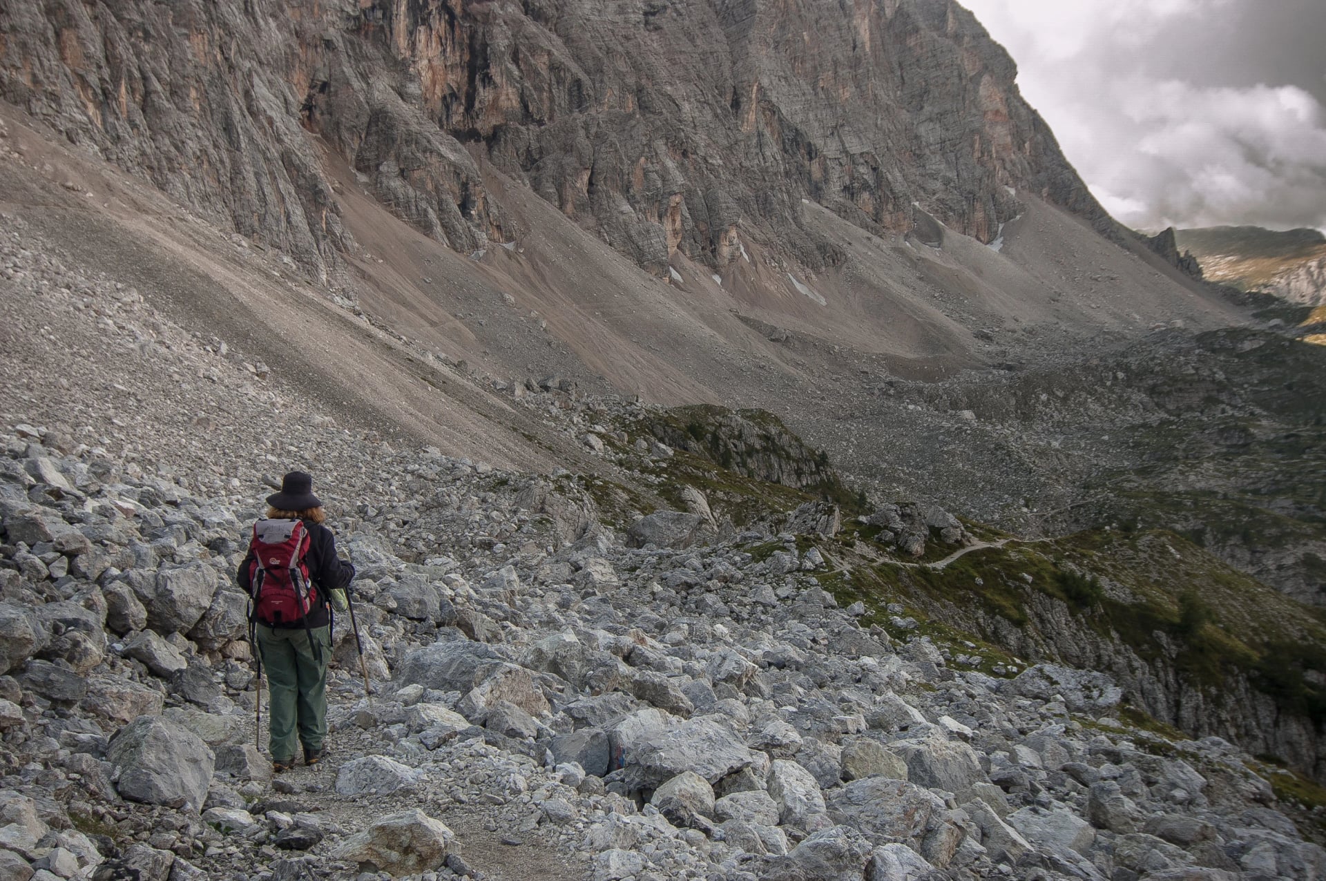 On trail from Coldai refuge via Coldai lake to Vazzoler refuge, along Civetta mountain range from north to south, stage 9 of Alta Via 1 classic long trek in the Dolomites, South Tirol, Italy.