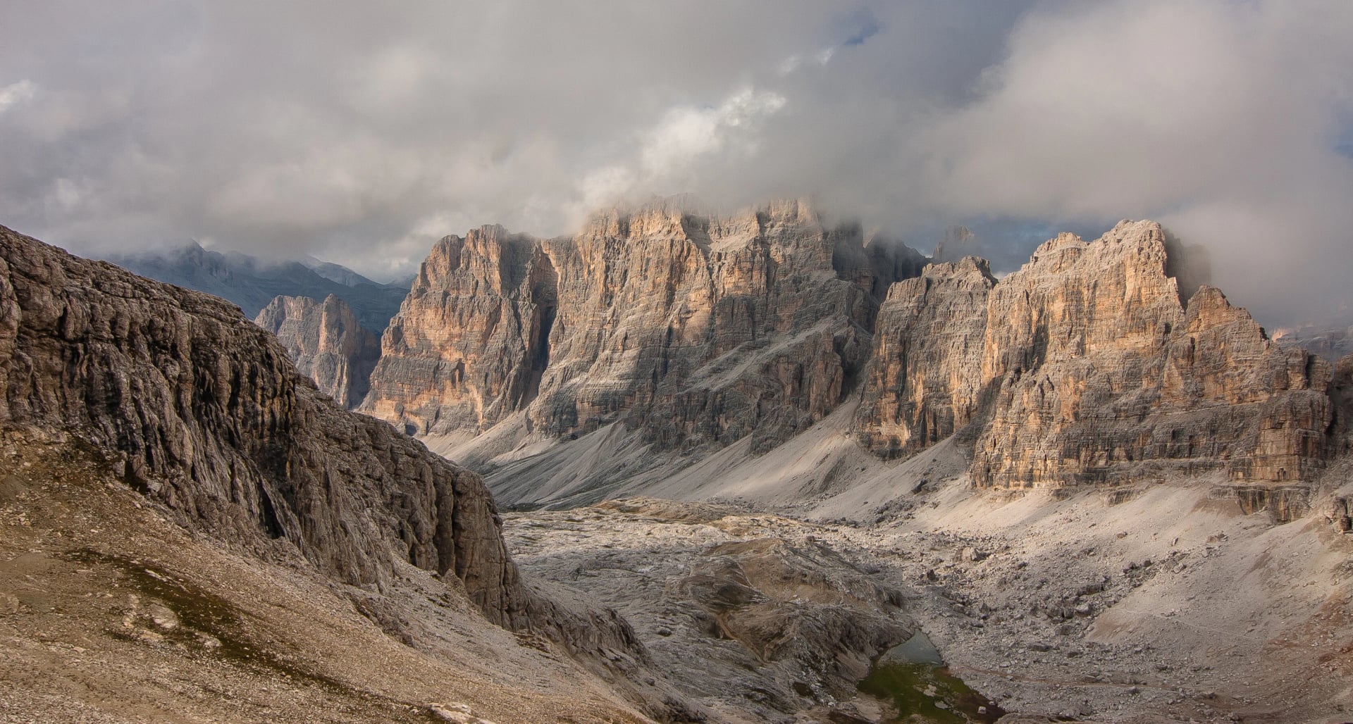 On the final stretch to Refugio Lagazuoi at the end of the long and relentless uphill climb on stage 2 of Alta Via 1 trek from Refugio Fanes to Refugio Lagazuoi, Dolomites, South Tirol, Italy.