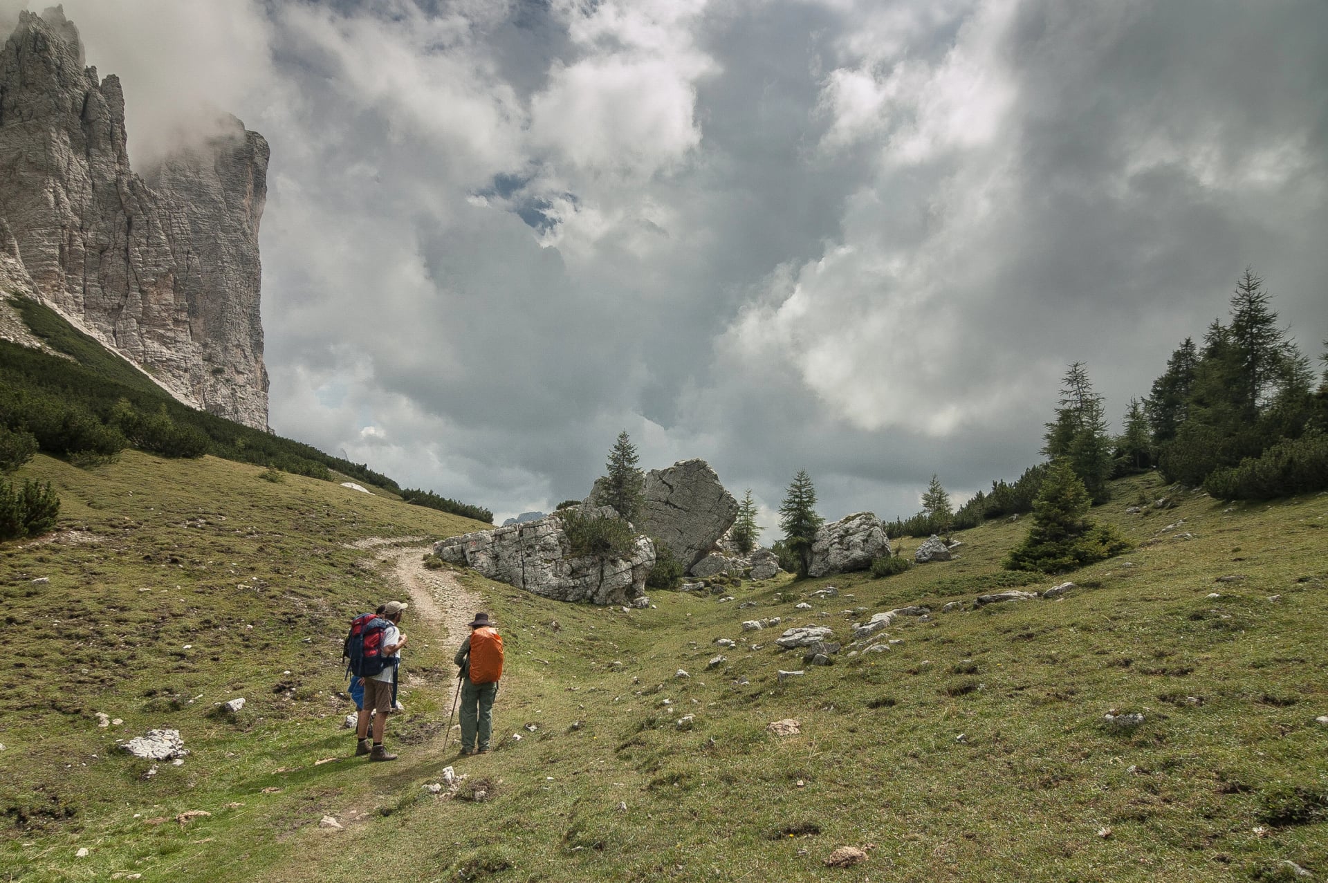 On trail from Coldai refuge via Coldai lake to Vazzoler refuge, along Civetta mountain range from north to south, stage 9 of Alta Via 1 classic long trek in the Dolomites, South Tirol, Italy.
