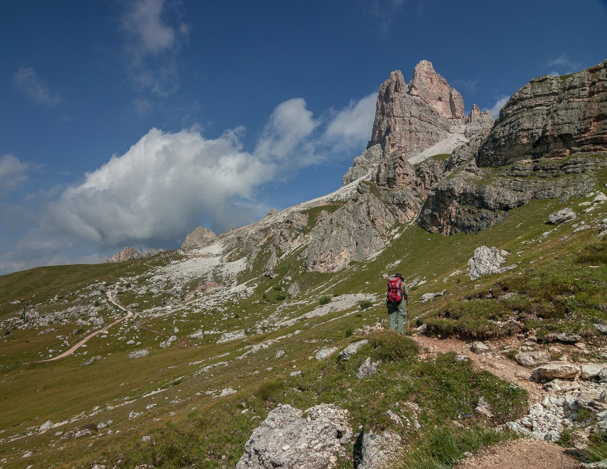 On trekking trail from Averau refuge, at the foot of Averau mountain, down to Passo Giau, Alta Via 1 long distance trek, Dolomites, South Tirol, Italy.