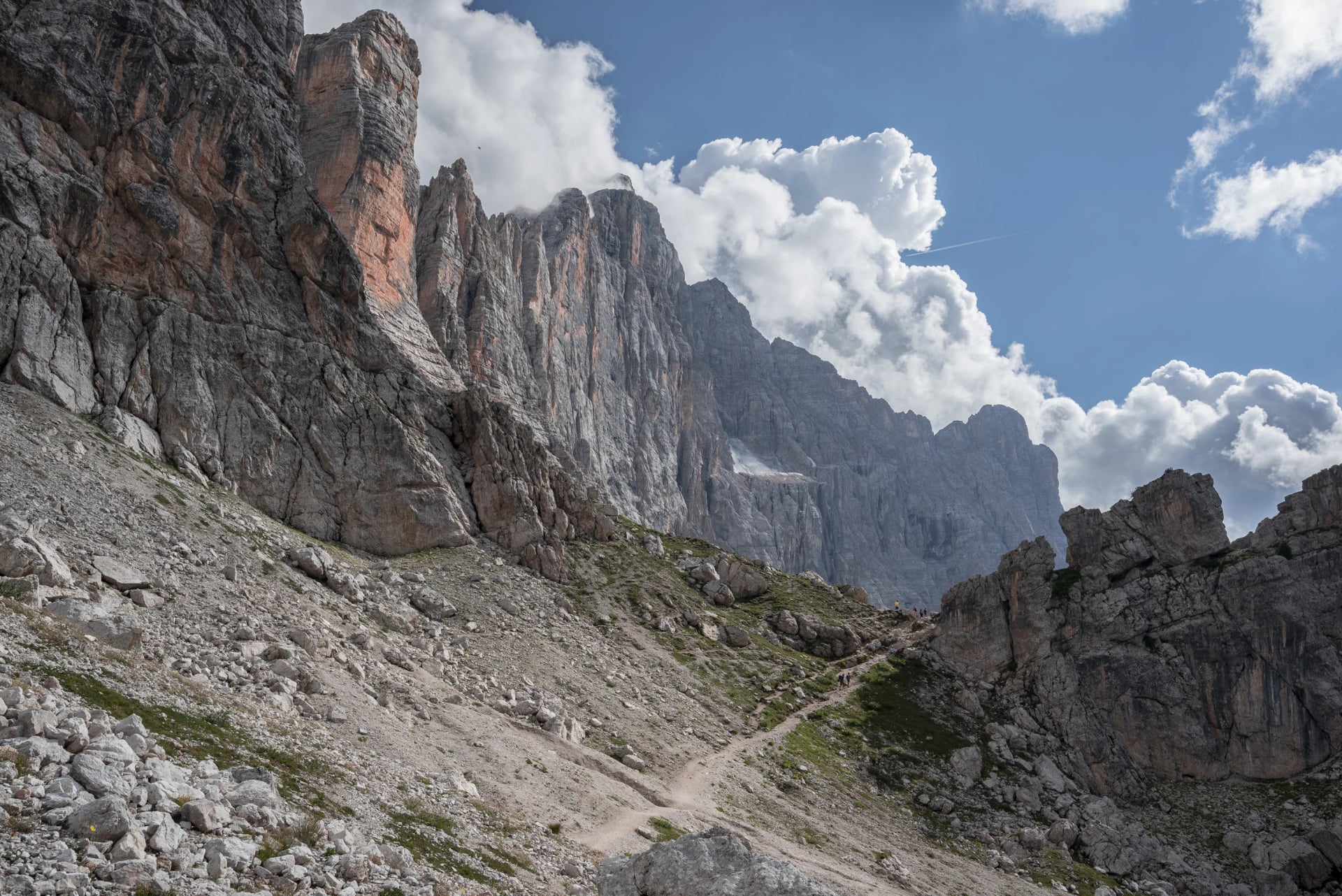 On Alta Via (High Route) Dolomiti #1 trail #560 from Coldai refuge to Tissi refuge via Col (pass) Negro di Coldai at the foot of Civetta mountain range, Dolomites, Alleghe village, Belluno, Italy