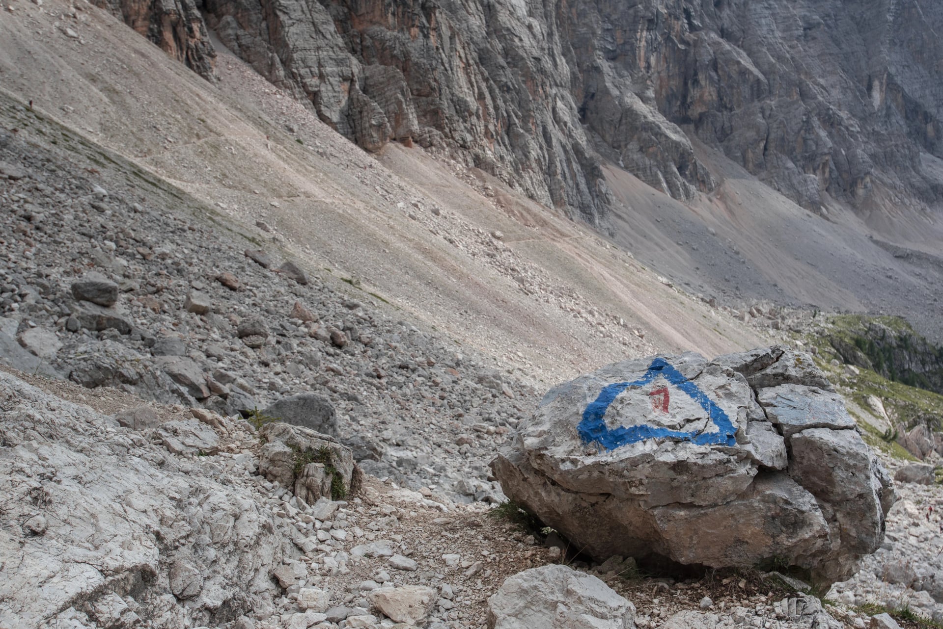 On Alta Via (High Route) Dolomiti #1 trail #560 from Coldai refuge to Tissi refuge via Col (pass) Negro di Coldai at the foot of Civetta mountain range, Dolomites, Alleghe village, Belluno, Italy
