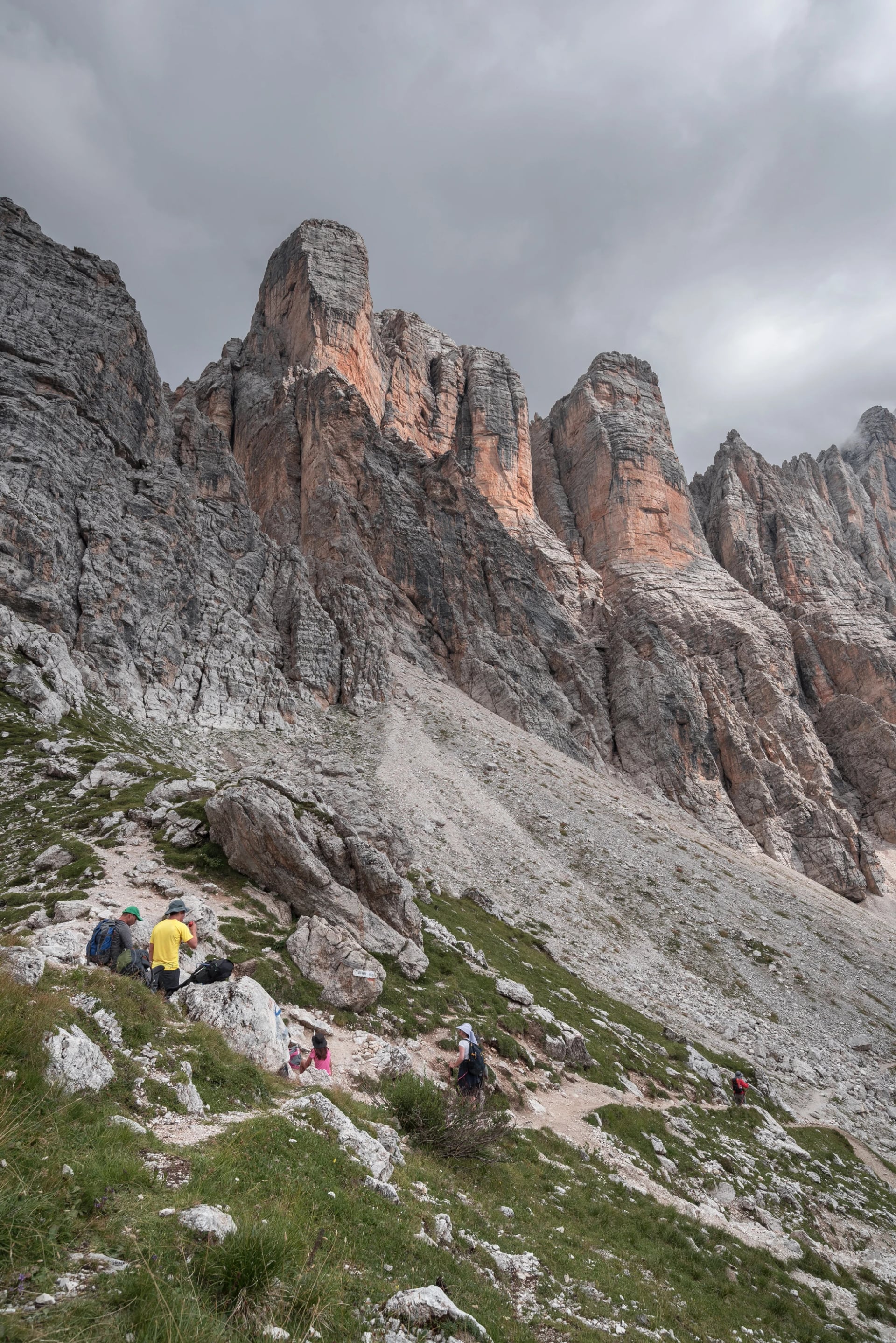 On Alta Via (High Route) Dolomiti #1 trail #560 from Coldai refuge to Tissi refuge via Col (pass) Negro di Coldai at the foot of Civetta mountain range, Dolomites, Alleghe village, Belluno, Italy