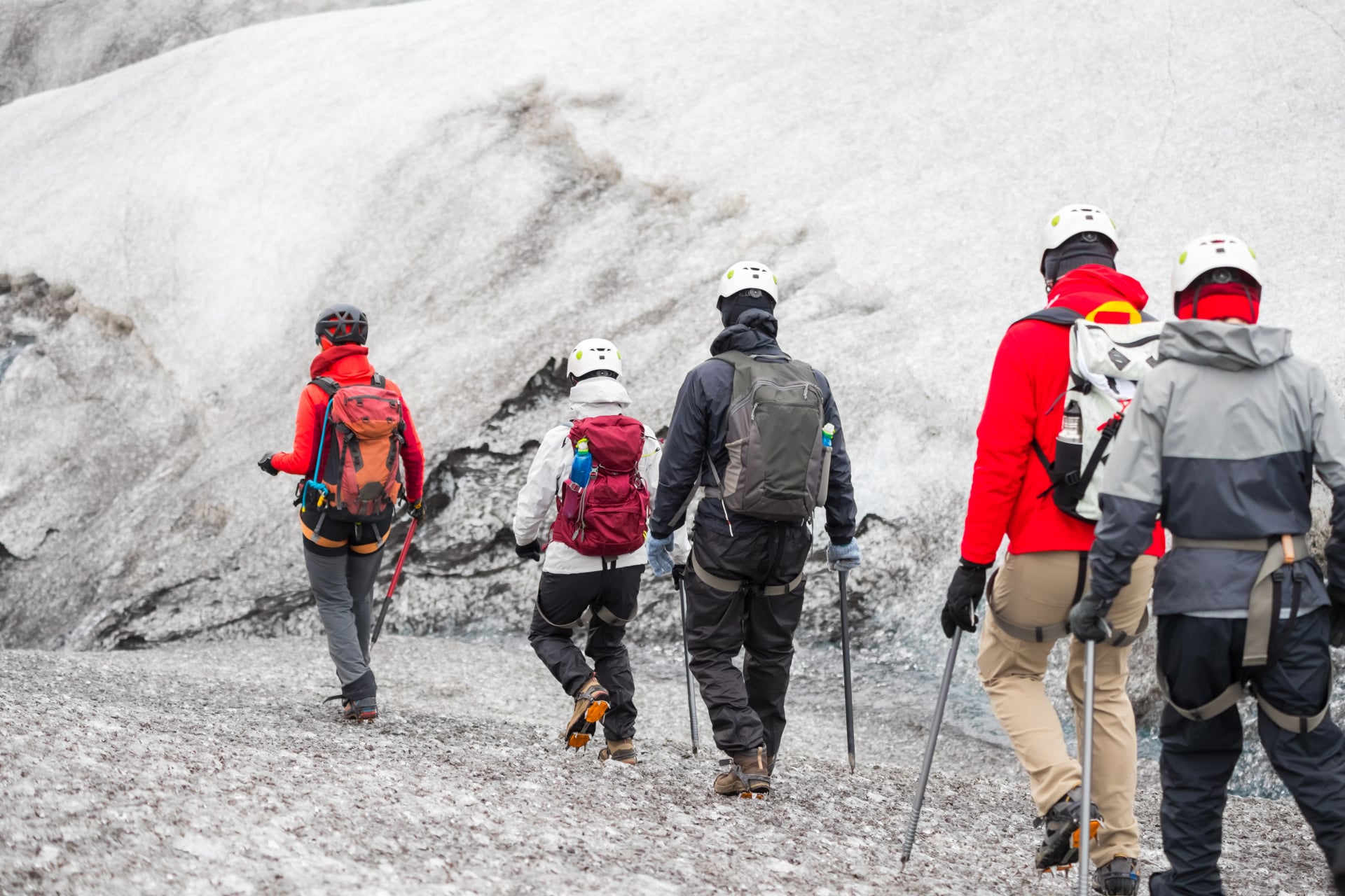 Group of tourists heading to the guided tour on Solheimajokull glacier, Iceland