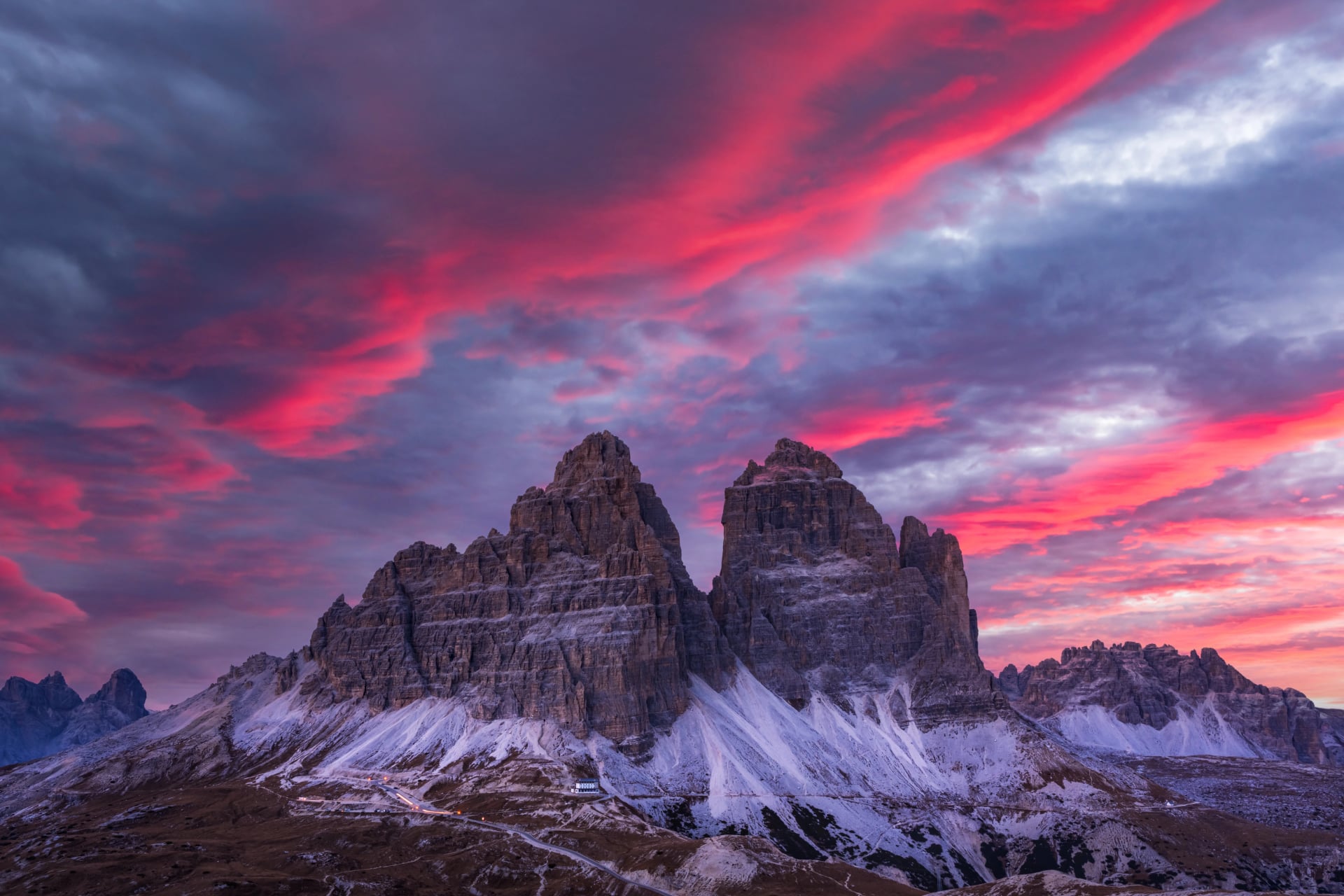 Incredible purple sunset at Three peaks of Lavaredo mountains. Auronzo refugio at Tre Cime Di Lavaredo National Park, Dolomite Alps, Trentino Alto adige, Italy