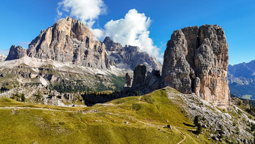 Cima Tofana di Mezzo and Cinque Torri in the Dolomites, Italy – Aerial Panoramic Scenic Landscape with Clouds, Late August